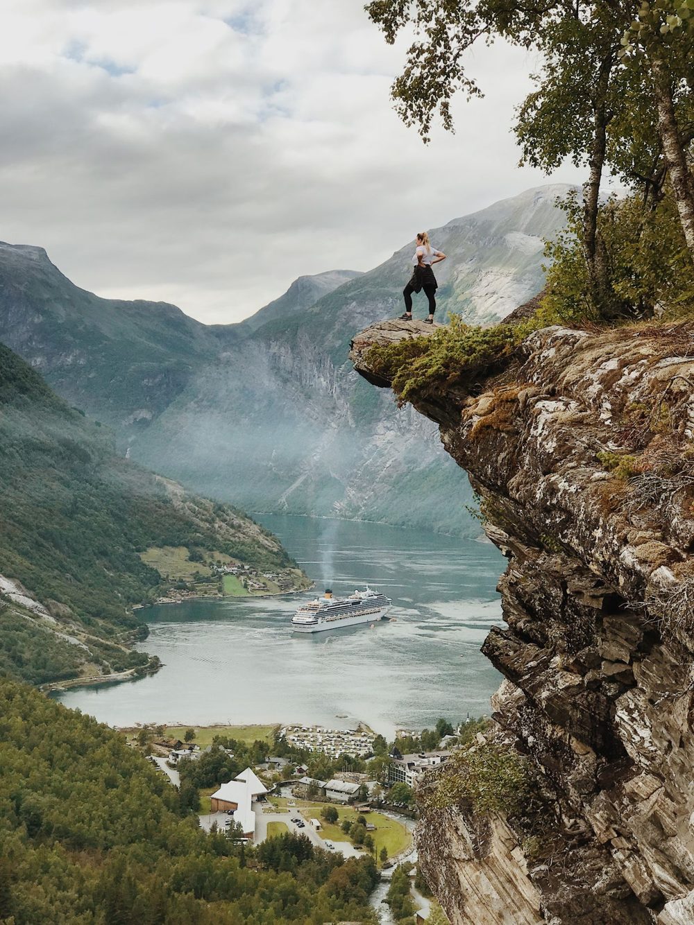 View from a cliff over the Geirangerfjord with a cruise ship